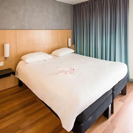Отель Ibis Rennes Beaulieu Сессон-Севинье Экстерьер фото